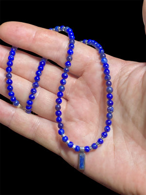 Simple & stylish short necklace of Afghan lapis with a silver and lapis pendant, highlighted with silver beads and a sterling silver parrot clasp. Length 41 cm