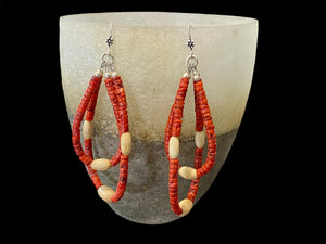 Long tribal earrings, two nested teardrop hoops of coral and buffalo bone beads, finished with sterling silver beads and hooks.  Total 9 cm length