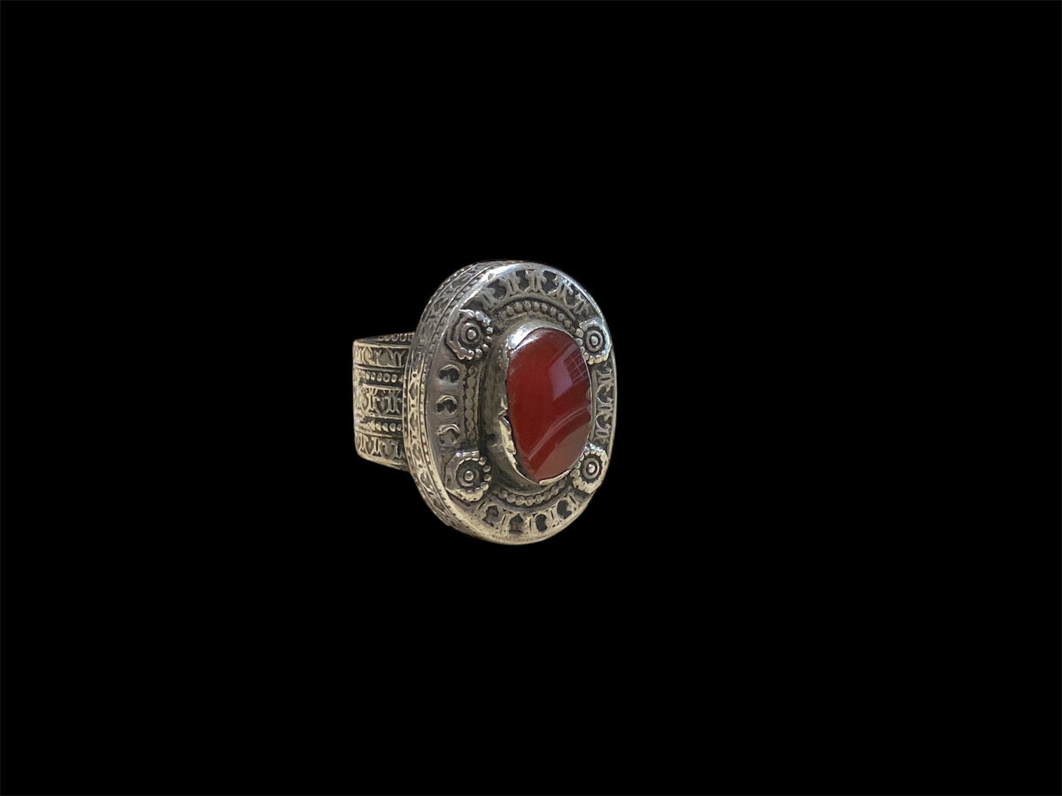 Bought in 2016 in a village on the Pakistan border, these rings are typically rustic Afghani mens' jewellery. Silver & carnelian. Face 3 x 2 cm, height 1.2 cm
