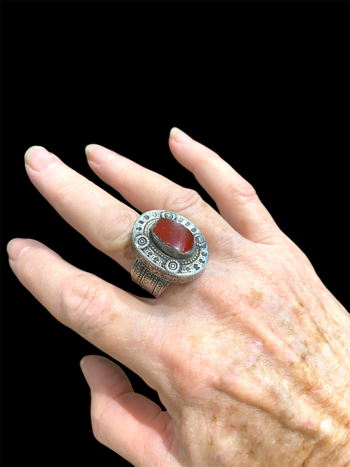 Bought in 2016 in a village on the Pakistan border, these rings are typically rustic Afghani mens' jewellery. Silver & carnelian. Face 3 x 2 cm, height 1.2 cm