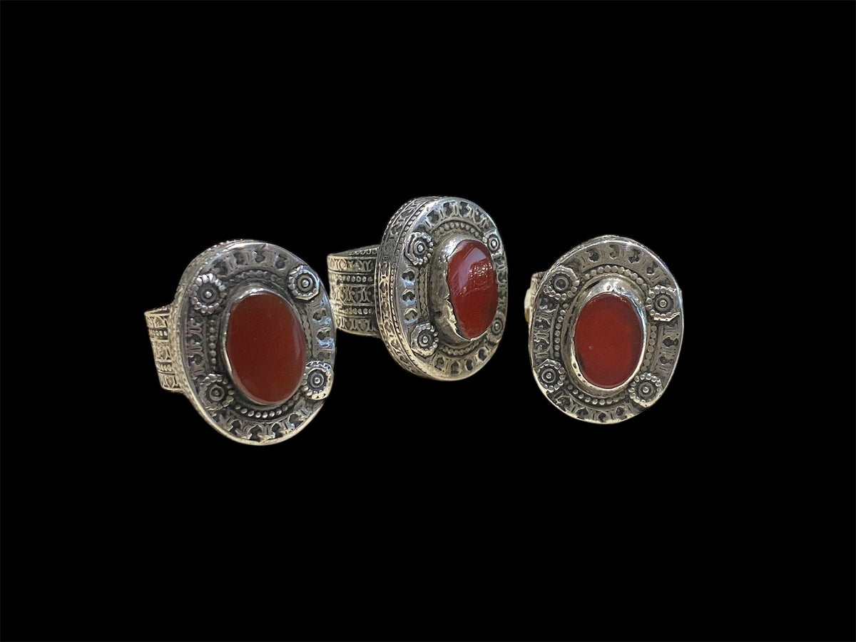 Bought in 2016 in a village on the Pakistan border, these rings are typically rustic Afghani mens' jewellery. Silver & carnelian. Face 3 x 2 cm, height 1.2 cm