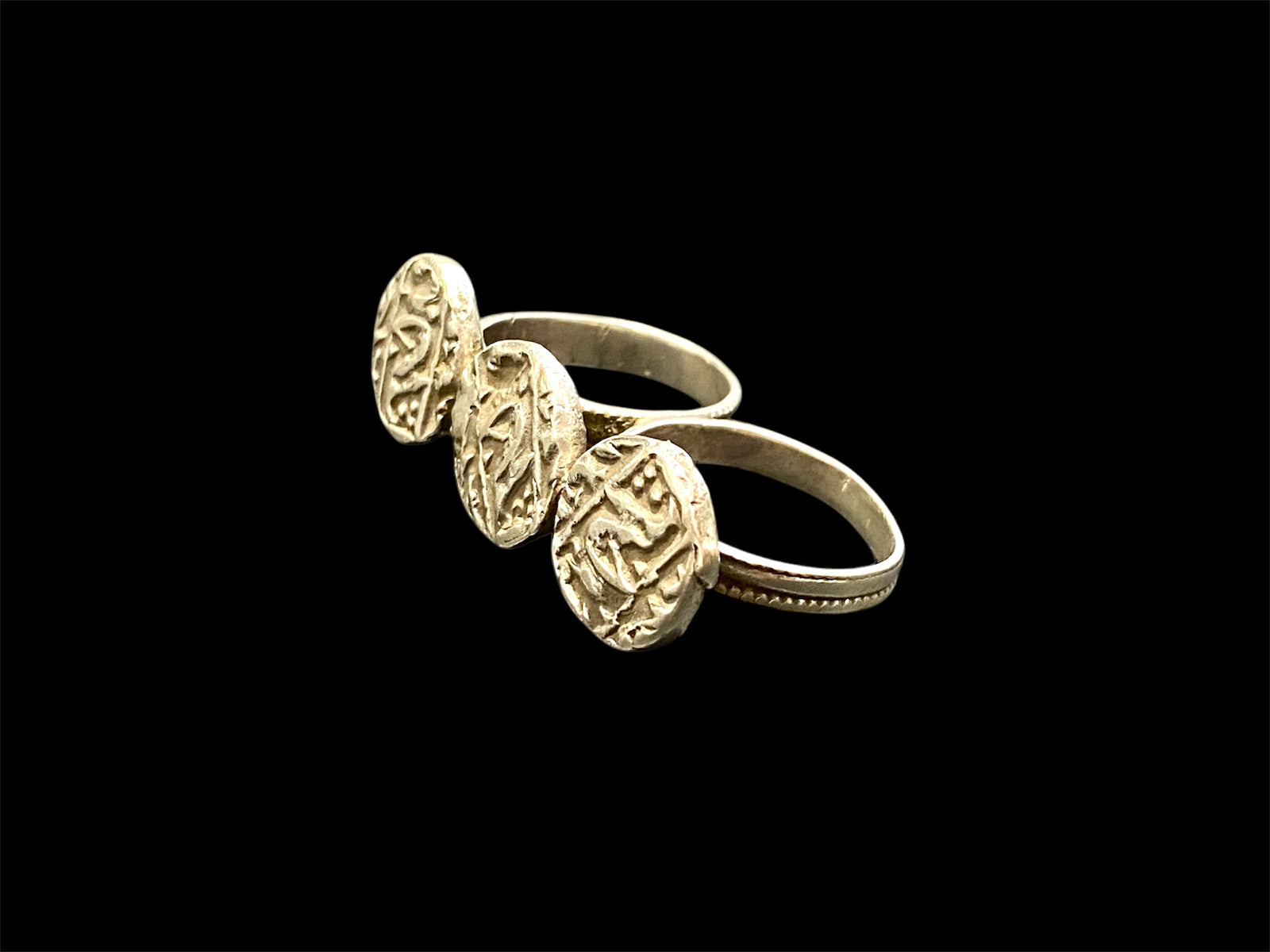 Rare Rabari double ring, India. Three original Mogul coins and a double finger ring. High grade silver, early 20th C, coins 19th C. Both rings 19 mm, US size 9