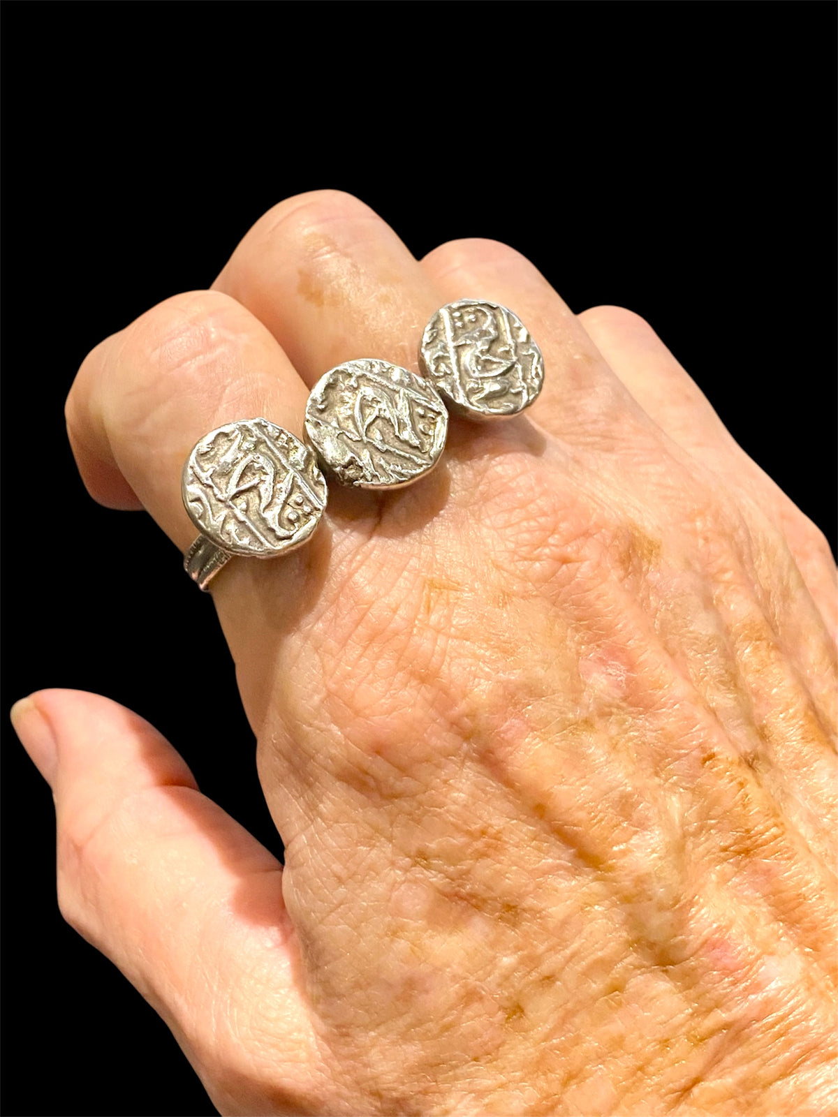 Rare Rabari double ring, India. Three original Mogul coins and a double finger ring. High grade silver, early 20th C, coins 19th C. Both rings 19 mm, US size 9