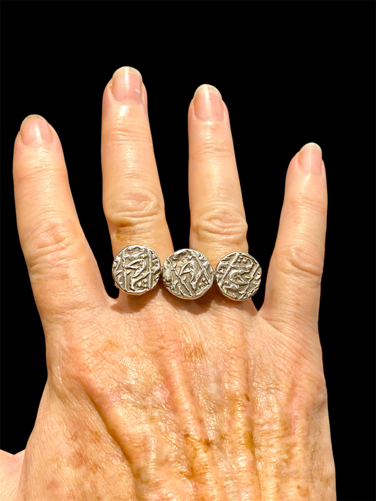 Rare Rabari double ring, India. Three original Mogul coins and a double finger ring. High grade silver, early 20th C, coins 19th C. Both rings 19 mm, US size 9