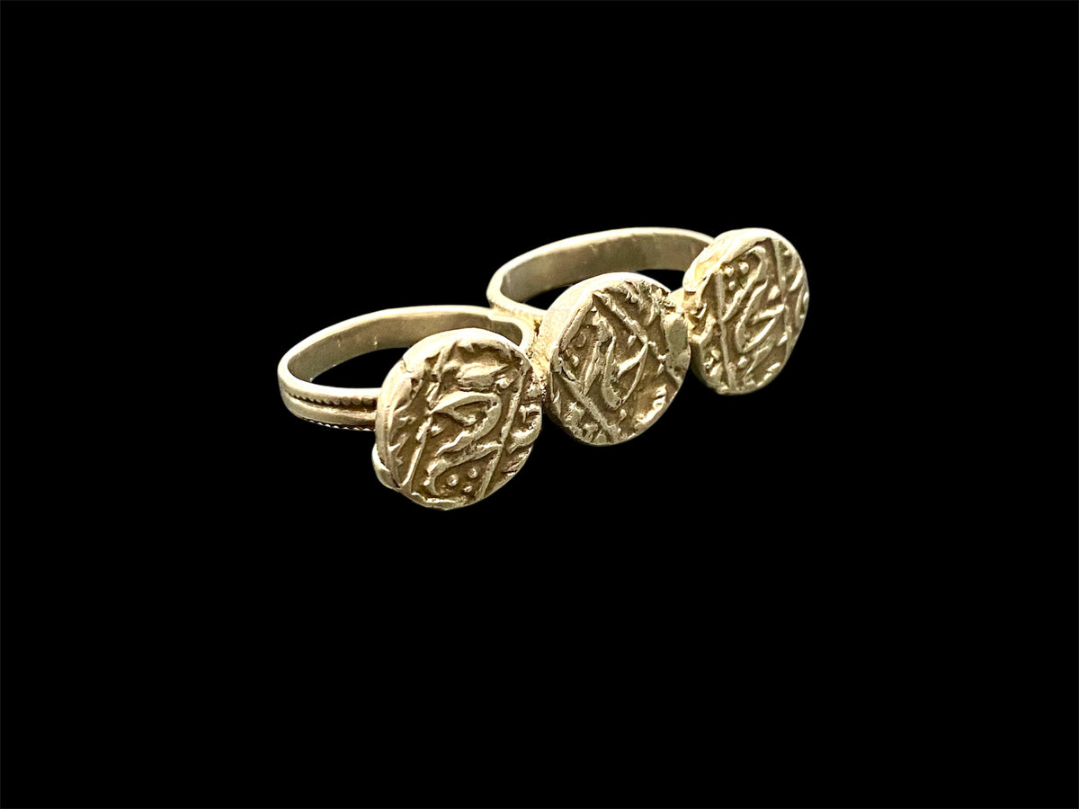 Rare Rabari double ring, India. Three original Mogul coins and a double finger ring. High grade silver, early 20th C, coins 19th C. Both rings 19 mm, US size 9