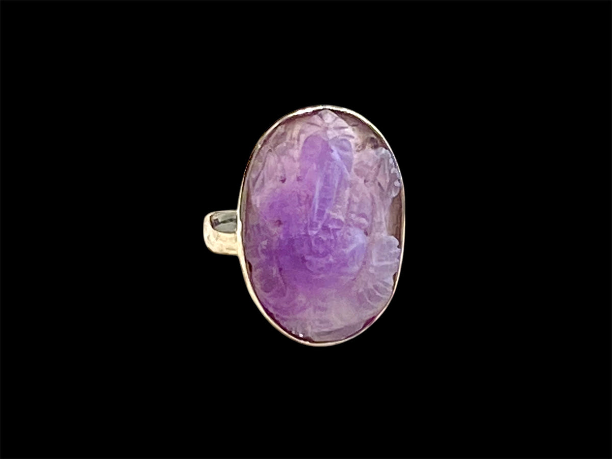 Carved amethyst ring featuring Ganesh, set in sterling silver. Measurements: Stone length 2.2 cm, width 1.5 cm US Size 7 | Inside diameter 17.35 mm