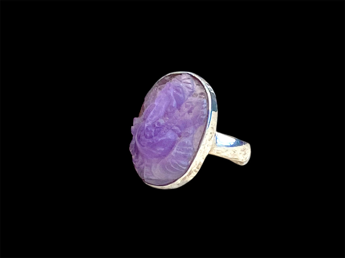 Carved amethyst ring featuring Ganesh, set in sterling silver. Measurements: Stone length 2.2 cm, width 1.5 cm US Size 7 | Inside diameter 17.35 mm