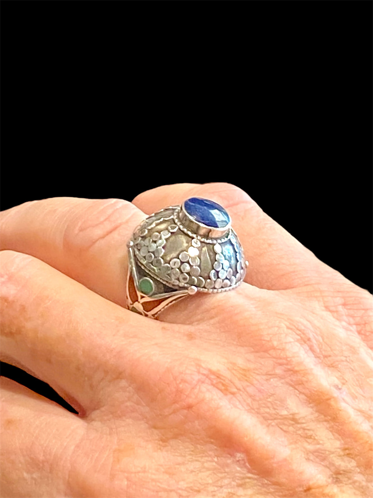 Dome shaped ring features Afghan lapis, turquoise and coral. Sterling silver. Afghanistan. Measurements: face 2.3 cm diameter, Sizing: 18.25 mm | Size 8