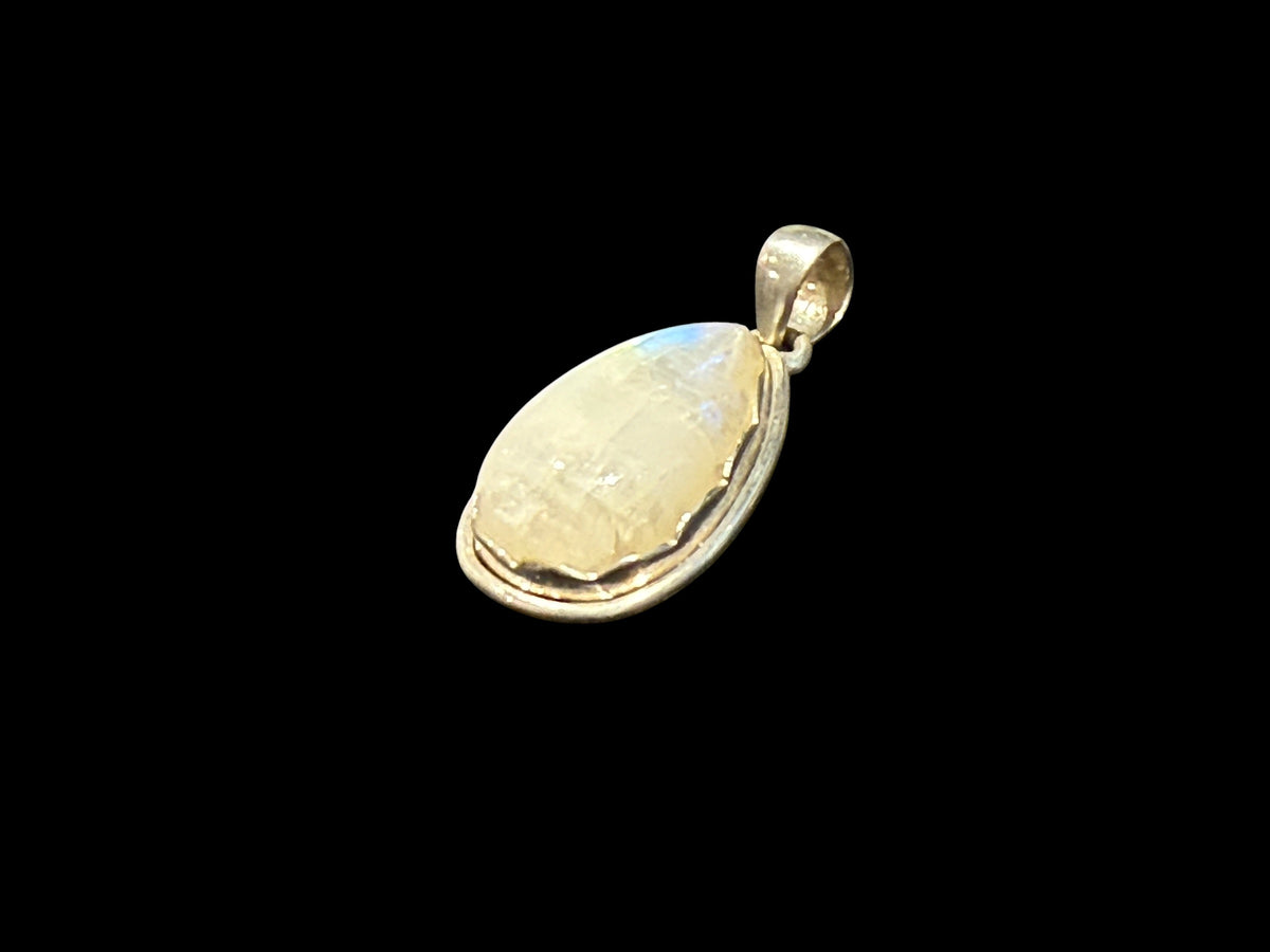 Teardrop rainbow moonstone pendant set in a scalloped sterling silver mount with a generous bail. Length including bail 4 cm, width 1.9 cm