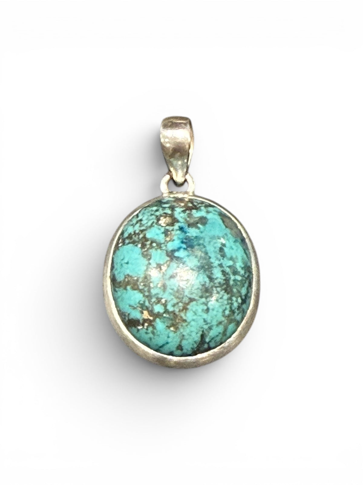 Large turquoise pendant with sterling silver bezel and bail.  Height 4 cm including bail, pendant 3 x 2.4 cm