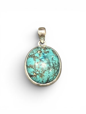 Large turquoise pendant with sterling silver bezel and bail.  Height 4 cm including bail, pendant 3 x 2.4 cm