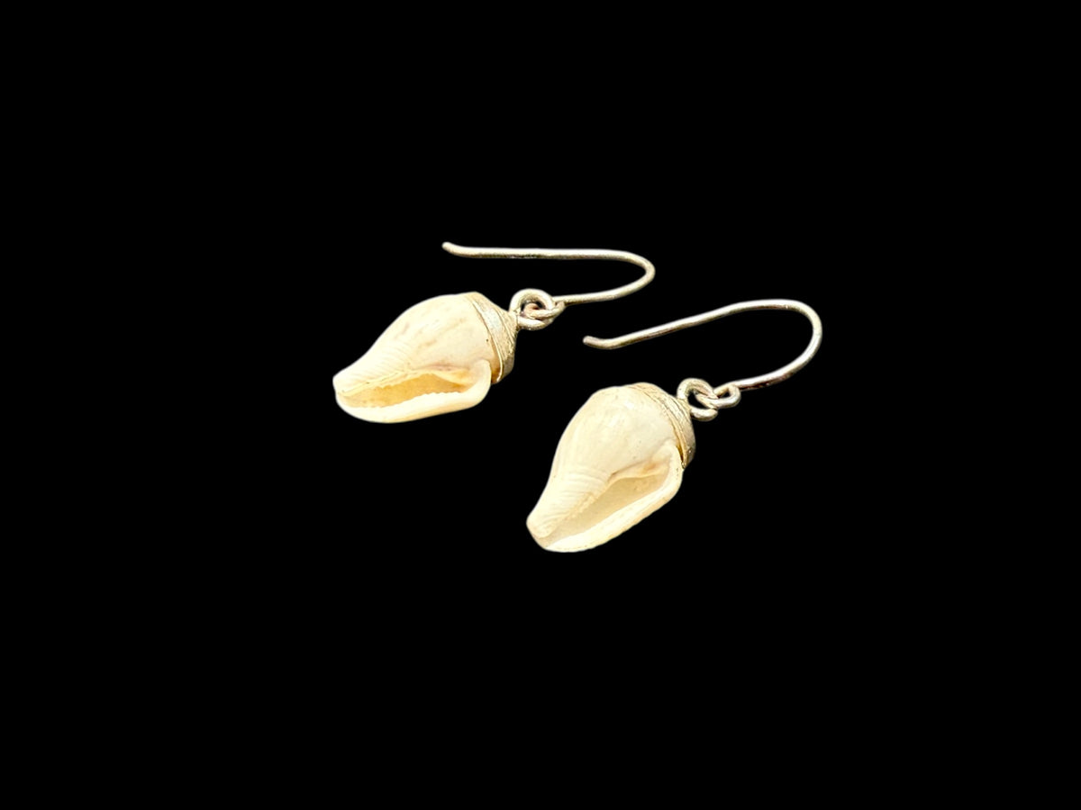 Simple and petite natural shell earrings finished with sterling silver mounts and hooks. Length including hook 2.7 cm