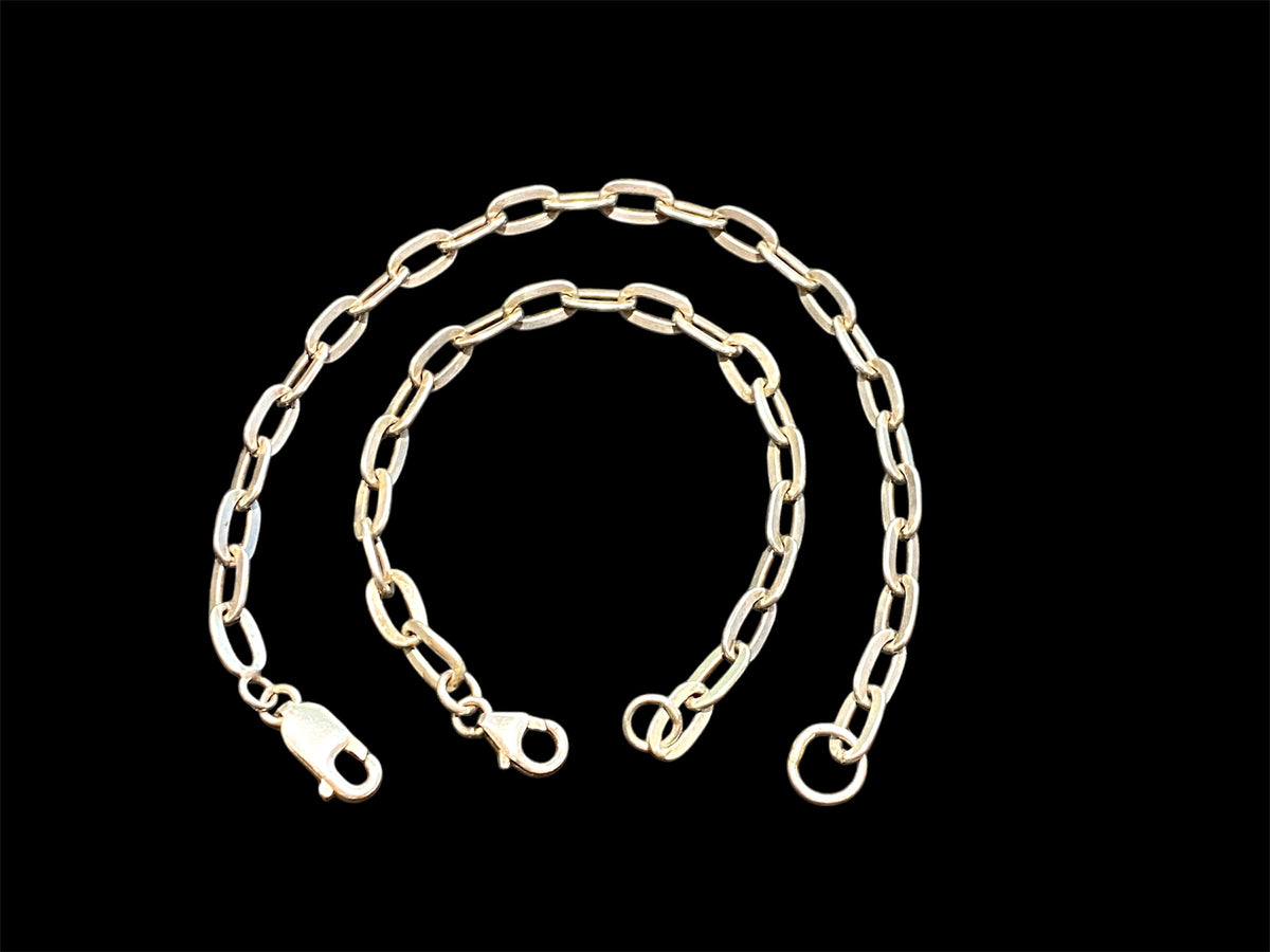 Sterling silver link bracelet. Wear as an elegant piece of jewellery on its own, stacked with other bracelets or use it as a base to add your own charms. These are unisex bracelets. Long 20 cm, short 15.8 cm
