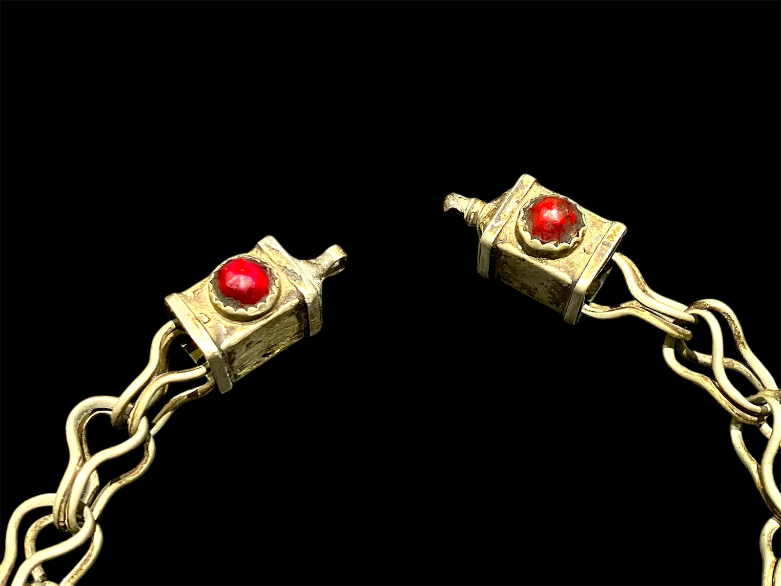 Vintage (1920 - 1940) Moroccan Berber cloak chain. Coin Silver. Set with glass "gems", engraved box finials, ball centrepiece. Length 55 cm