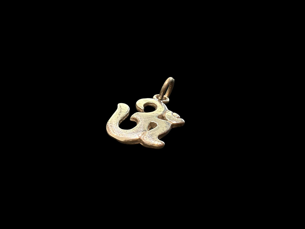 Our smallest Om pendant, made from sterling silver. Height including bail 2 cm