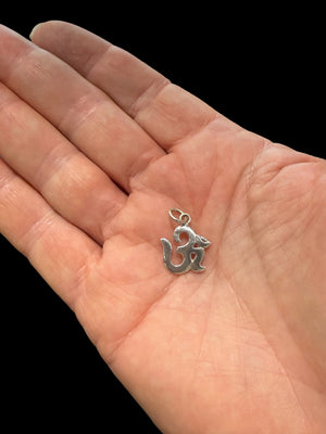Our smallest Om pendant, made from sterling silver. Height including bail 2 cm