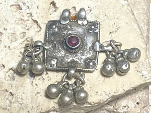 Square high grade silver amulet with dangles and gem decoration. Early to mid 19th century, Rajasthan. Note that the bails are very worn as shown. Height with dangles and bail 4 cm, width 4 cm