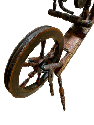 European handcrafted Saxony spinning wheel with excellent aged patina. 19th century. Handmade from turned wood.