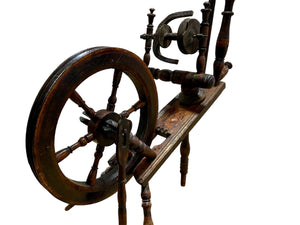 European handcrafted Saxony spinning wheel with excellent aged patina. 19th century. Handmade from turned wood.