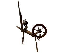 European handcrafted Saxony spinning wheel with excellent aged patina. 19th century. Handmade from turned wood.