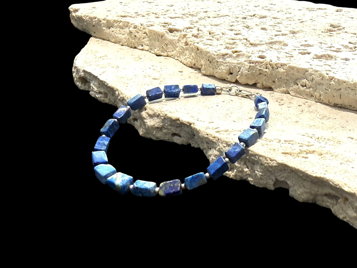 Organic look irregular square cut lapis lazuli bead and silver bracelet. 