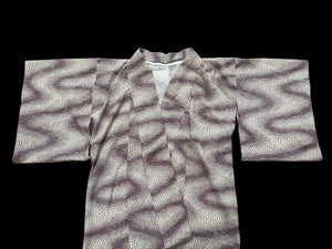 Traditional vintage Japanese kimono with a red stingray skin pattern on a cream background. Brand new.