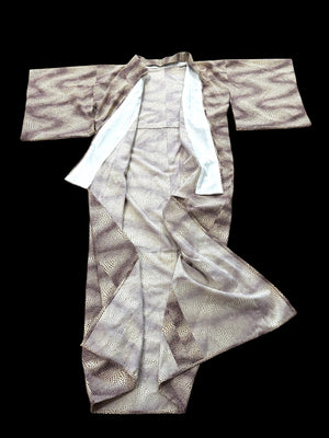 Traditional vintage Japanese kimono with a red stingray skin pattern on a cream background. Brand new.