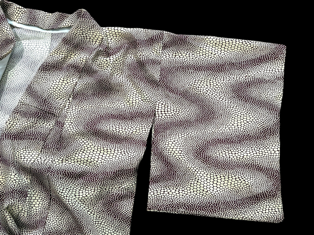 Traditional vintage Japanese kimono with a red stingray skin pattern on a cream background. Brand new.