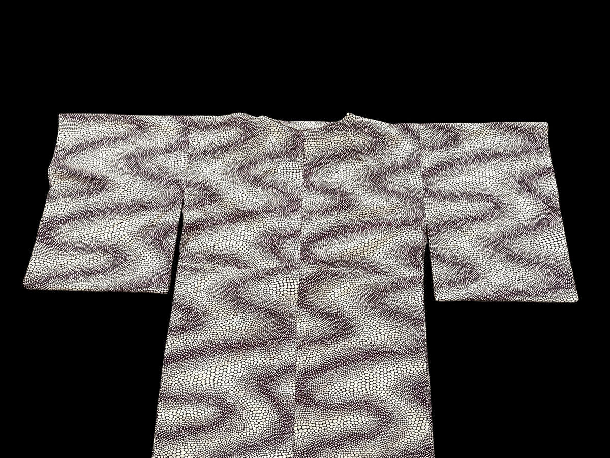 Traditional vintage Japanese kimono with a red stingray skin pattern on a cream background. Brand new.