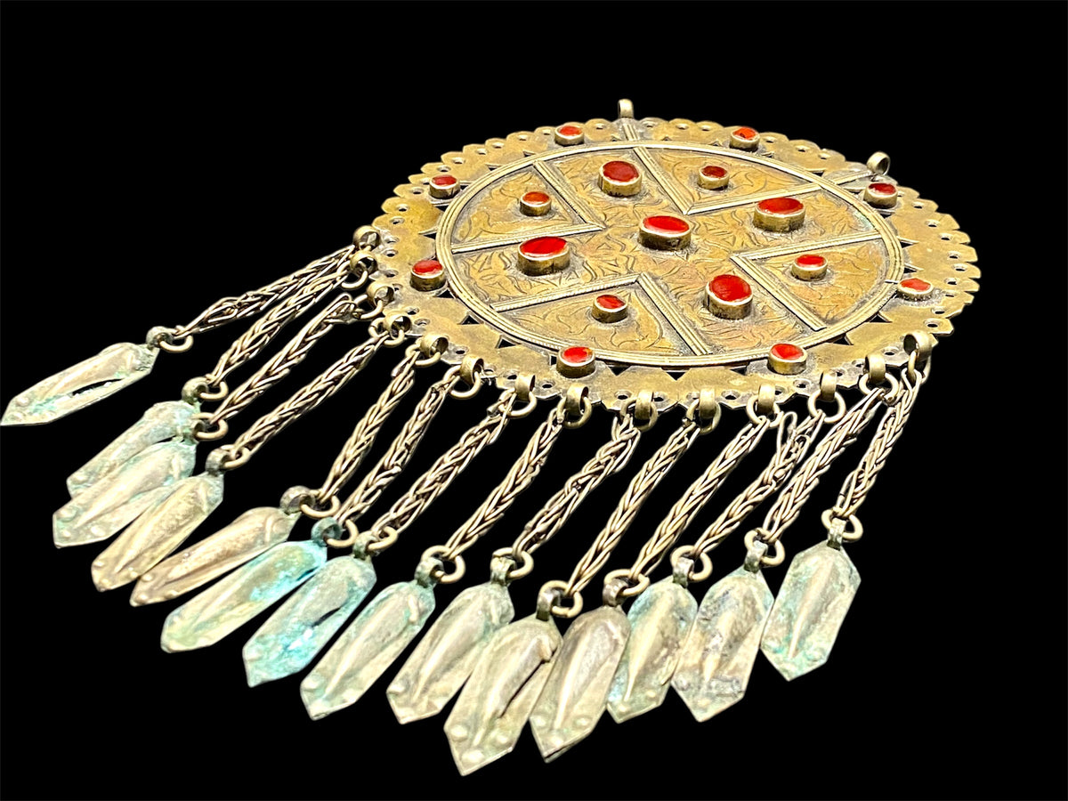 Large round shaped ornament (gonzuk). Tekke Turkoman, early 20th century. Height 23.5 cm