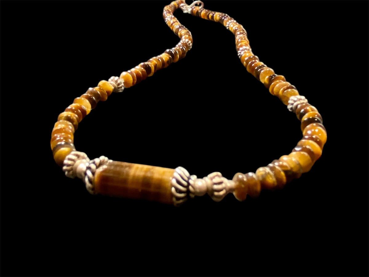 Rondel bead tigers eye necklace features vintage Indian silver beads and detailing. Unisex necklace. Length 44.5 cm