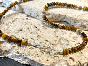 Rondel bead tigers eye necklace features vintage Indian silver beads and detailing. Unisex necklace. Length 44.5 cm