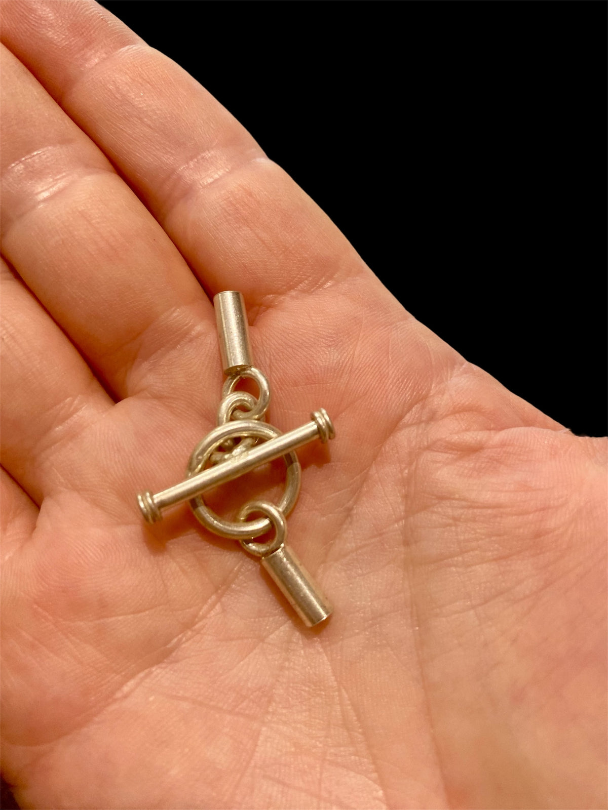 Large sterling silver toggle bars and matching connector rings with glue-in cord end caps. Price is per pair, two ends to complete a necklace. Total length of joined clasp 4.5 cm. Inside diameter of glue in end 3 mm