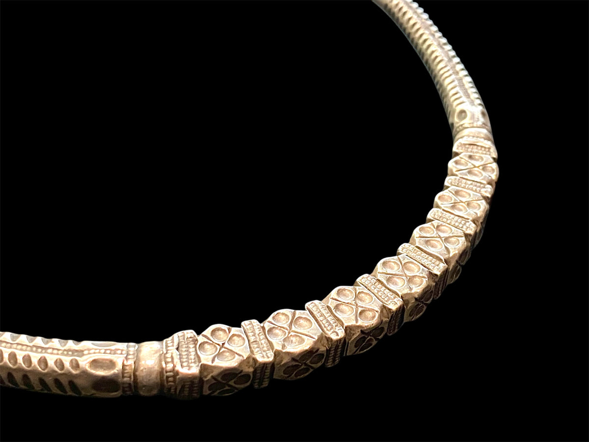 Solid silver hansuili torc necklace. Gujarat, early to mid 20th C. Inside width 13.8 cm, at opening 6.5 cm