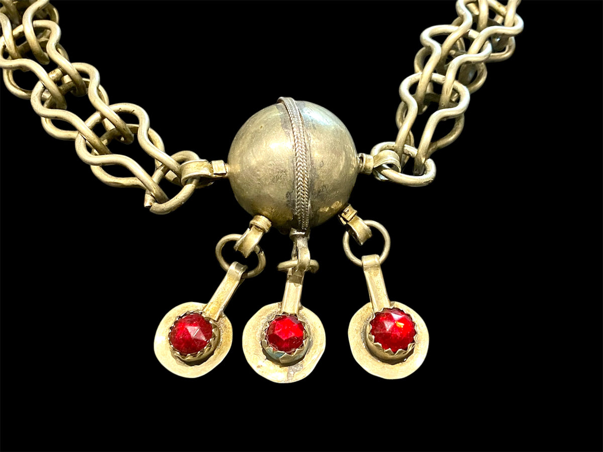 Vintage (1920 - 1940) Moroccan Berber cloak chain. Coin Silver. Set with glass "gems", engraved box finials, ball centrepiece. Length 57 cm
