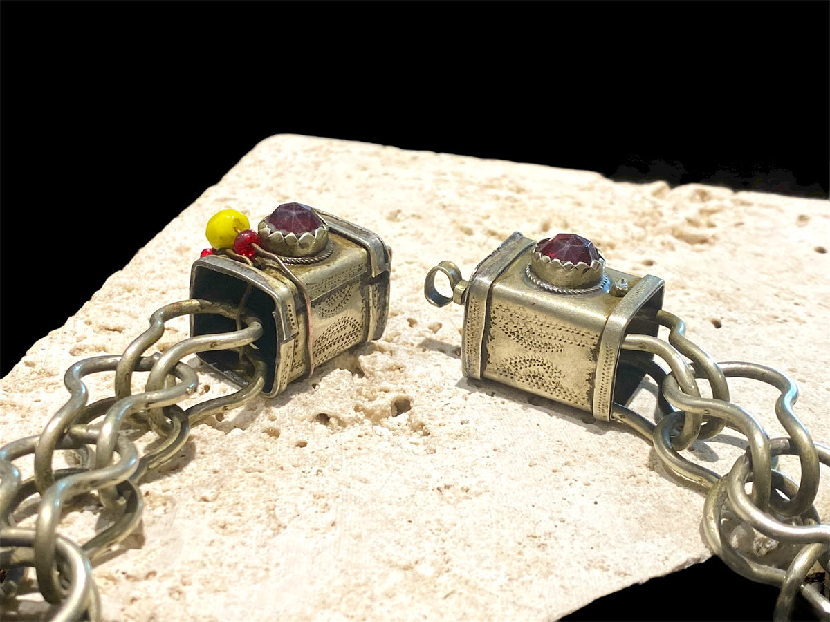 Vintage (1920 - 1940) Moroccan Berber cloak chain. Coin Silver. Set with glass "gems", engraved box finials, ball centrepiece. Length 57 cm