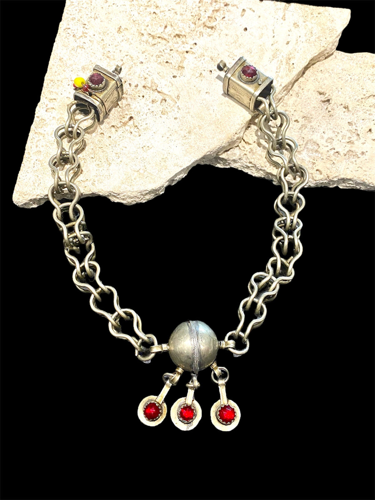 Vintage (1920 - 1940) Moroccan Berber cloak chain. Coin Silver. Set with glass "gems", engraved box finials, ball centrepiece. Length 57 cm