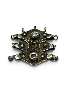 Antique Tunisian pendant with 3 bails and tubular fittings at back for stringing onto a necklace. High grade silver, 19th century. Height 3.8 cm, width 4 cm