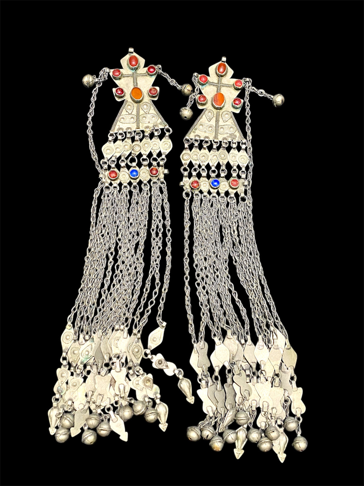 Turkoman headdress jewellery. Low grade or no silver, carnelian and glass stones, leaf and diamond shaped dangles and bells. Ersari. Mid 20th C. Length 43 cm