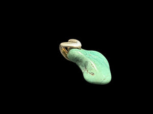Large, unusual freeform turquoise nugget topped with a striking sterling silver bail. 3.4 cm height including bail