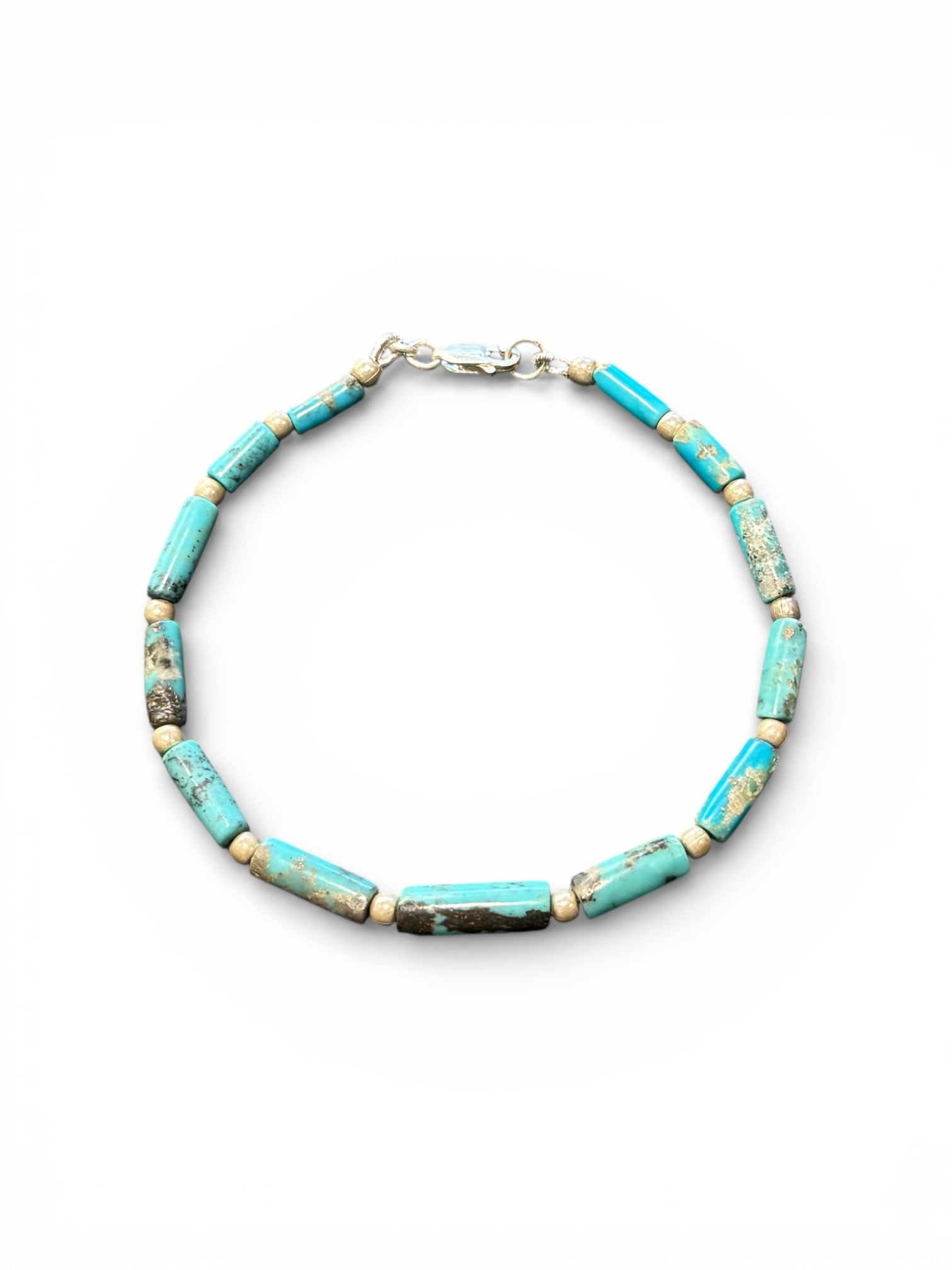 Turquoise bracelet of tube-cut, sky blue natural turquoise beads, with sterling silver detailing and clasp.  Order in different sizes.