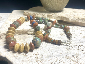 Old Tibetan turquoise, jasper and Afghani lapis lazuli make a standout, long unisex necklace in earthy, natural tones. Sterling silver clasp. Length 59 cm