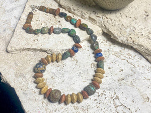 Old Tibetan turquoise, jasper and Afghani lapis lazuli make a standout, long unisex necklace in earthy, natural tones. Sterling silver clasp. Length 59 cm