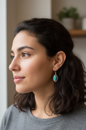 Our southwest earrings are made from Arizona turquoise set in wide sterling silver mounts. Length 4 cm including hook
