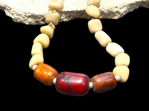 White coral & amber long necklace. Natural bamboo coral, antique amber & Bakelite prayer beads from Afghanistan, highlighted with sterling silver. Length 65.5