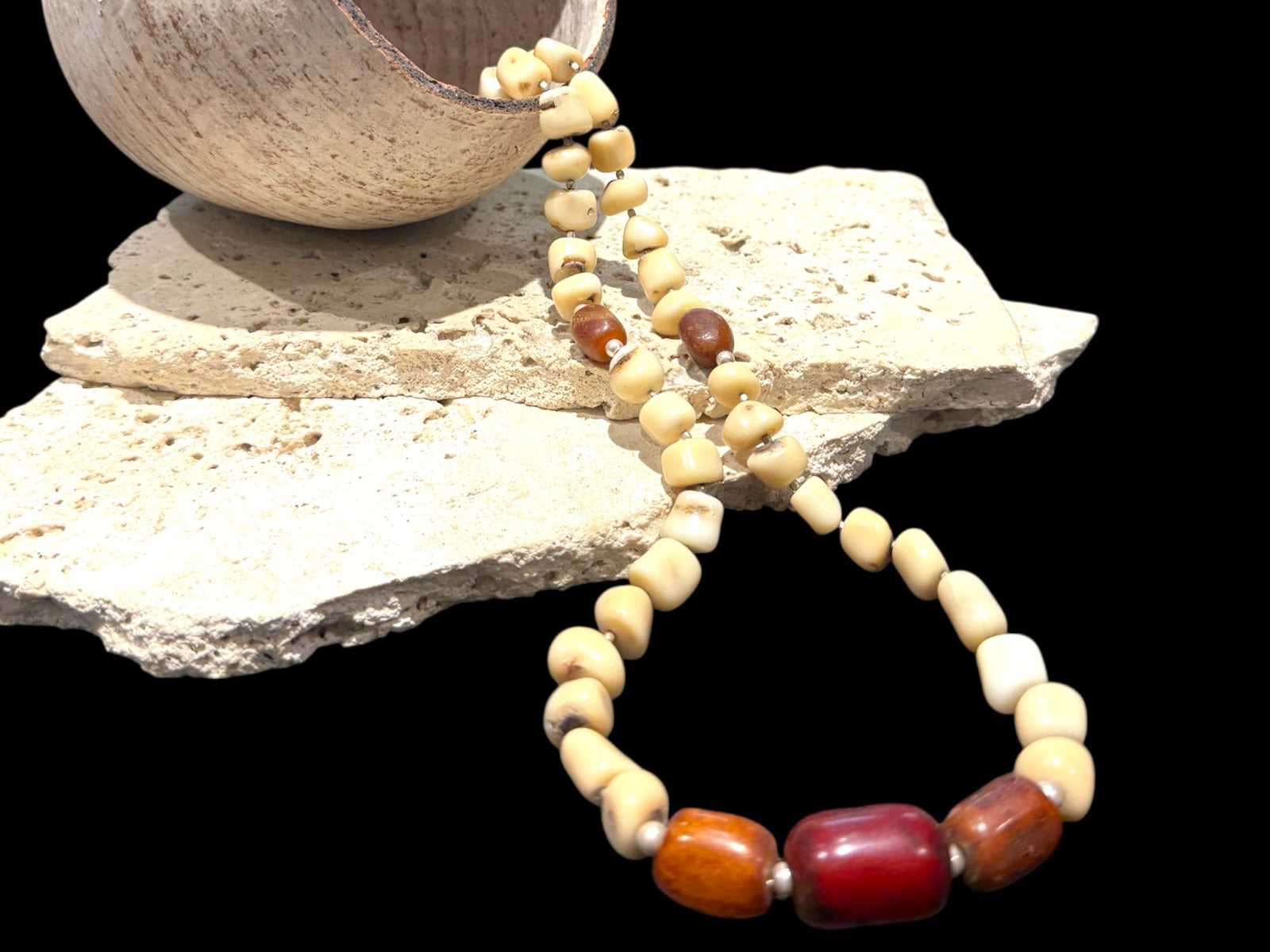 White coral & amber long necklace. Natural bamboo coral, antique amber & Bakelite prayer beads from Afghanistan, highlighted with sterling silver. Length 65.5