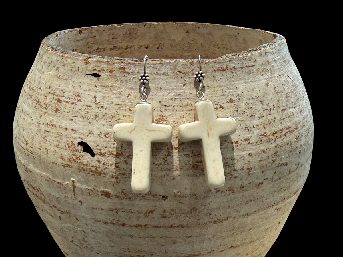 Bold Southwest crucifix earrings are hand crafted from natural creamy white howlite stone, finished with a handmade sterling silver rosette shepard hook. Height including hook 5 cm