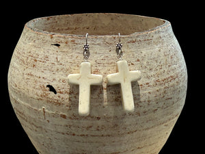 Bold Southwest crucifix earrings are hand crafted from natural creamy white howlite stone, finished with a handmade sterling silver rosette shepard hook. Height including hook 5 cm
