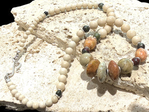 Tribally inspired, pastel toned stone necklace featuring pale turquoise, bloodstone, jasper and sterling silver.  Length 50 cm