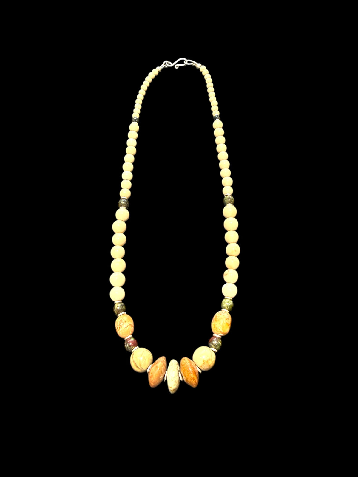 Tribally inspired, pastel toned stone necklace featuring pale turquoise, bloodstone, jasper and sterling silver.  Length 50 cm